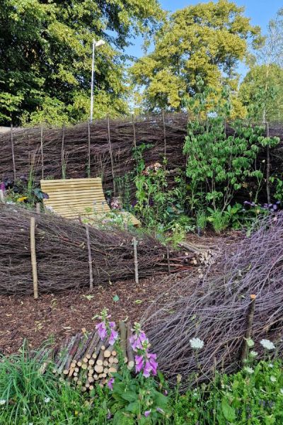 The RHS Wisley team designed this 'dead hedge' as a wildlife friendly garden screen.