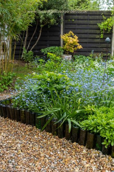 Garden edging made from wine bottles