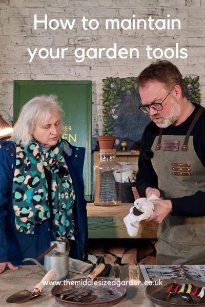 Dan Cooper showing me how to clean and maintain garden tools