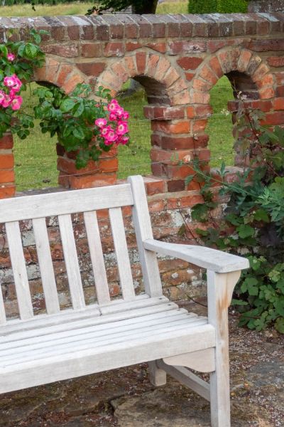 Wooden bench at Doddington Place Gardens