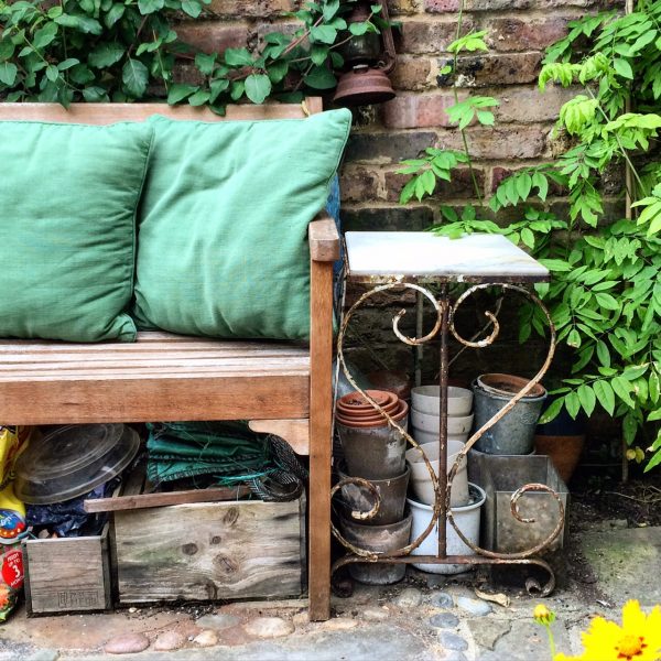 Use the space under the bench for storage