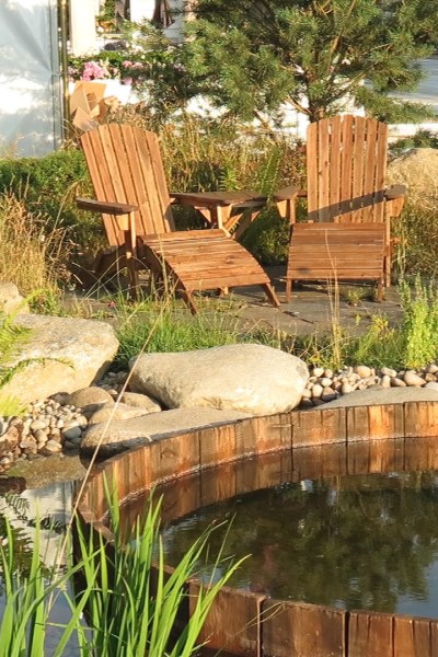 Create a seating area by your pond #backyard #gardendesign