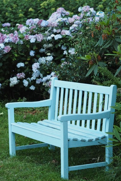 Blue bench at Doddington Place Gardens