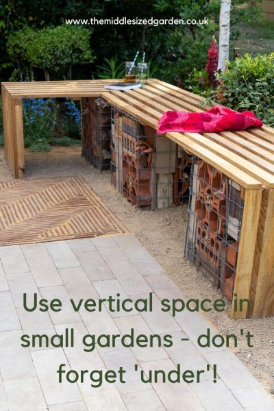 A bug hotel under a bench