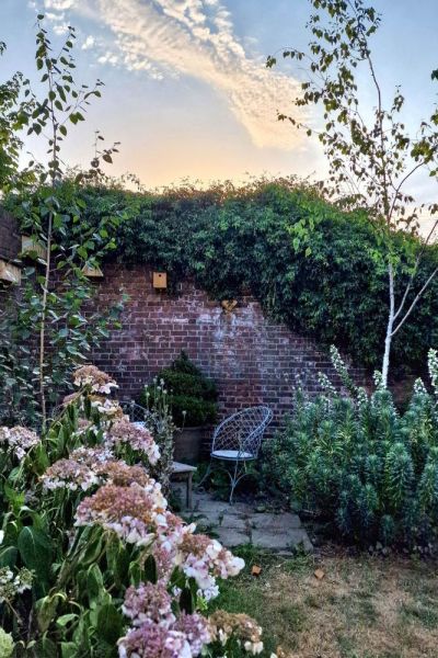 Turn a difficult shady corner into a relaxed seating area.