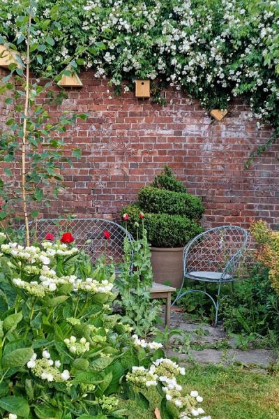 Shady corner with vintage seating