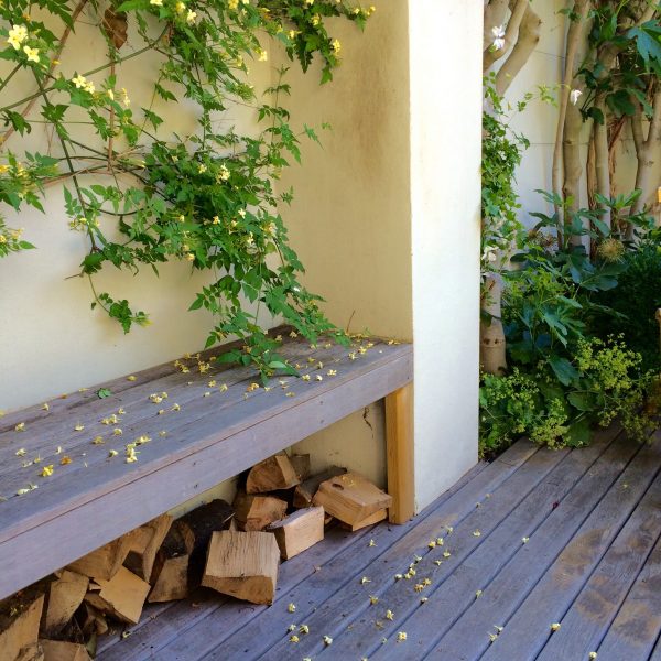 Garden bench as log storage.