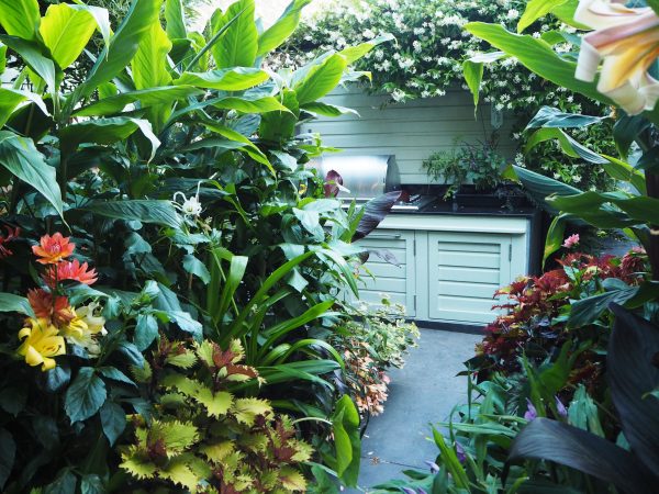 An outdoor kitchen in a garden for entertaining