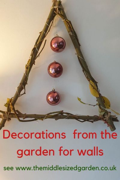 Use twigs to create a triangular wreath