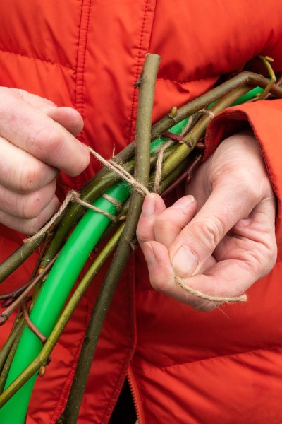 Tie twigs in around the frame