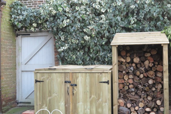 Our gate, log store and bin store before painting