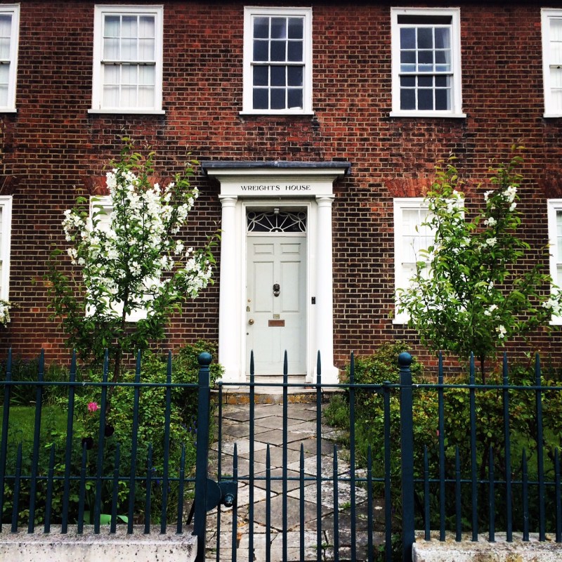 Malus hupehensis crab apples on either side of a garden gate give a sense of privacy without blocking any light.