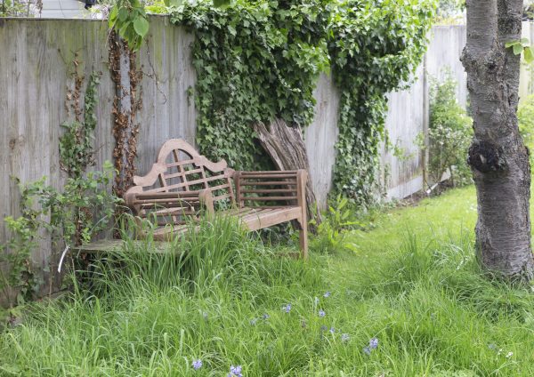 Lutyens bench in a long thin town garden