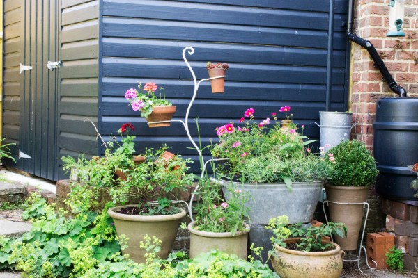 Paint your water butt to match your shed