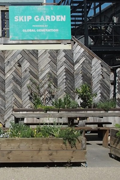 Planters on wheels in a city garden