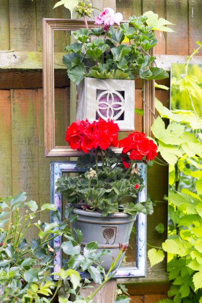 Small garden ideas on a budget - make use of charity shops and vintage finds in your garden #gardening #gardenideas