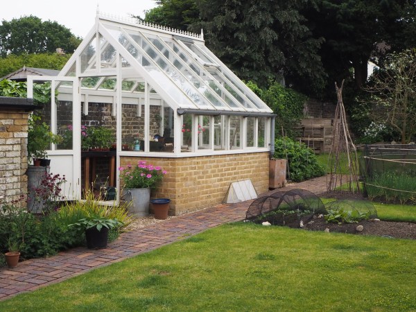 A practical and attractive position for a greenhouse