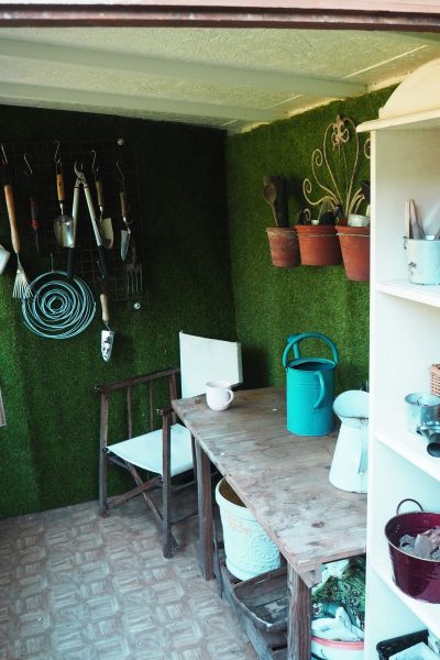 A simple upcycled potting shed with recycled storage