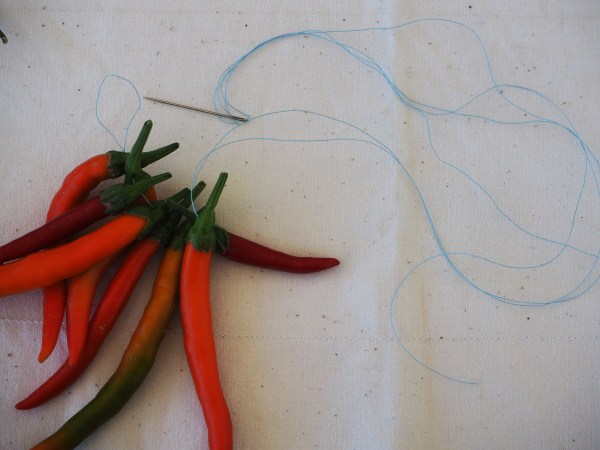 Threading chillies