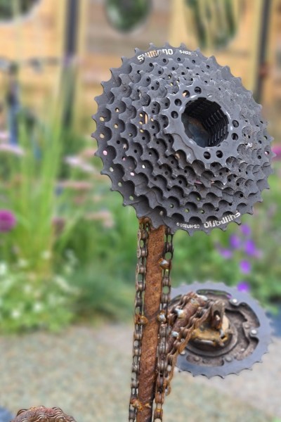 Flowers made of old bicycle parts.