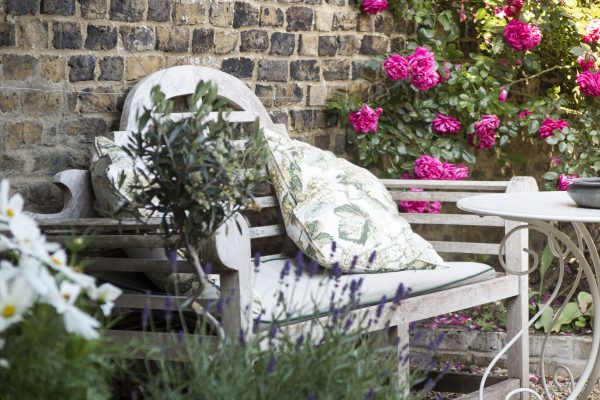 A bleached-out Nordic grey garden bench