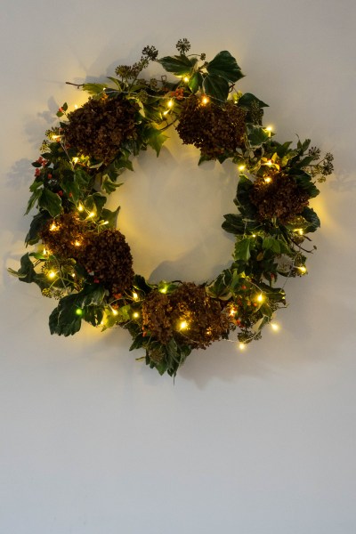 Buy fairy lights with a battery and timer for a wreath